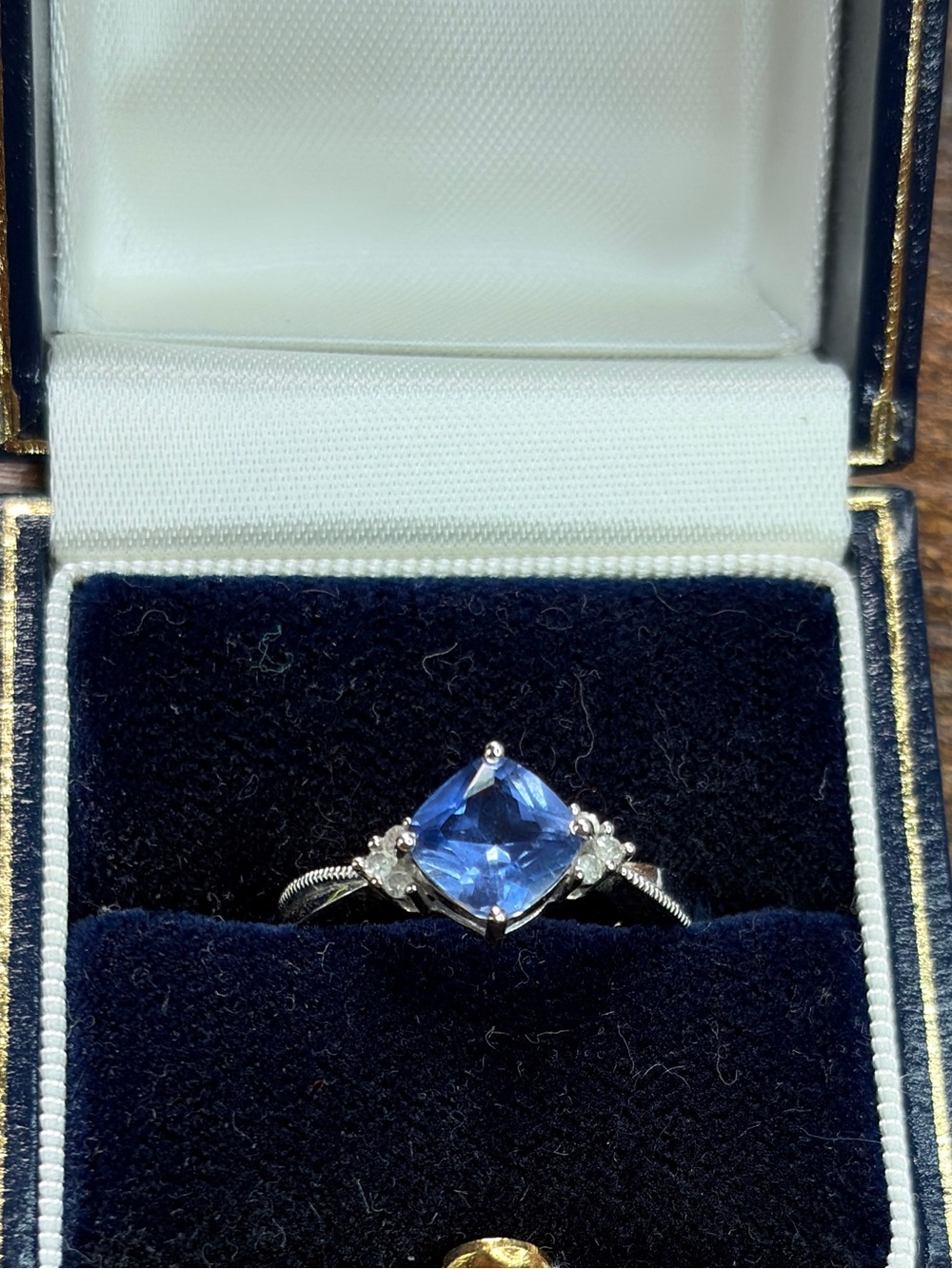 Stunning 10K White Gold Cushion Cut Tanzanite Accent Ring (Size 7) with CZ